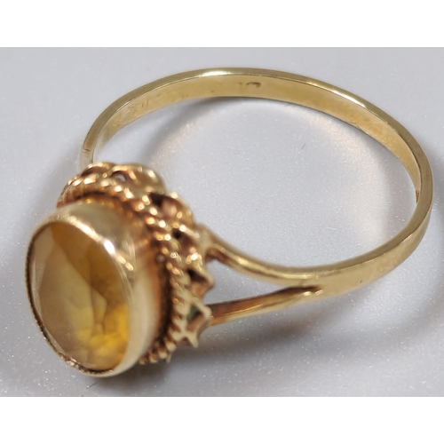 228 - 9ct gold orange stone dress ring. 2g approx. Size P.  (B.P. 21% + VAT)