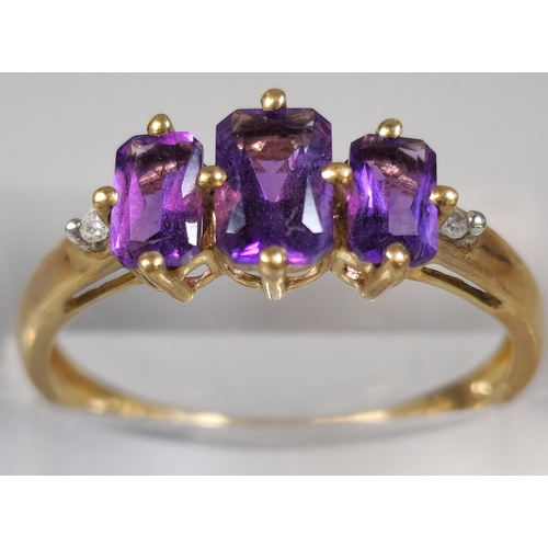 231 - 9ct gold purple stone dress ring. 1.6g approx. Size O1/2.  (B.P. 21% + VAT)