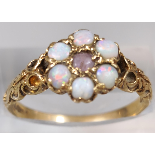 234 - 9ct gold opal flowerhead ring. 2.3g approx. Size O1/2.  (B.P. 21% + VAT)