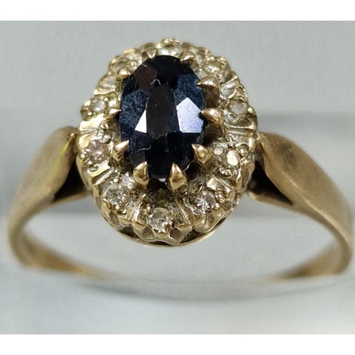 243 - 9ct gold diamond and sapphire multi-cluster ring. 2.1g approx. Size M.  (B.P. 21% + VAT)