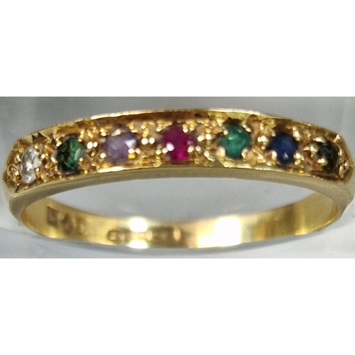 252 - 18ct gold channel set multi stone ring set with diamond, emerald, ruby and sapphire. 2.6g approx. Si... 