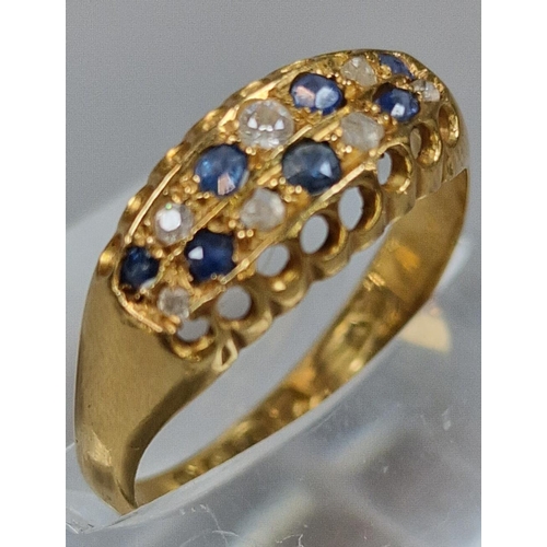 253 - 18ct gold blue and clear stone multi cluster ring. 2.2g approx. Size O. (B.P. 21% + VAT)