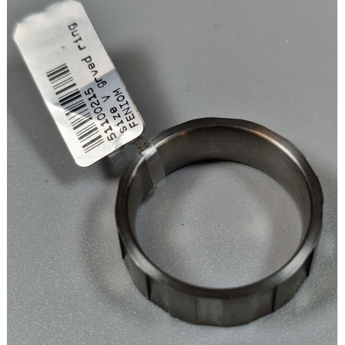 254 - Modernist design titanium ring. Size T1/2. (B.P. 21% + VAT)