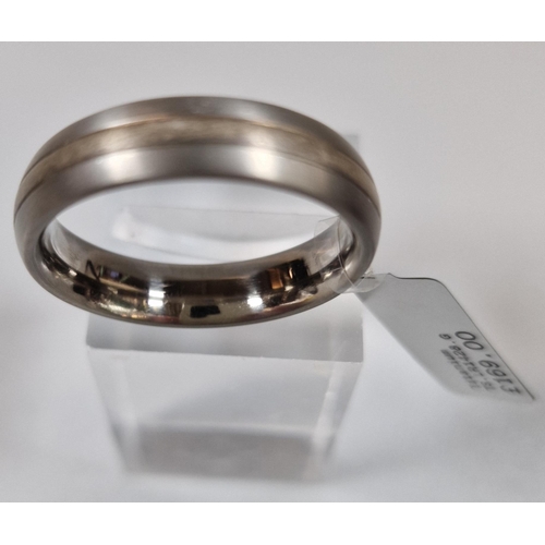 256 - Titanium modernist design ring. 5g approx. Size Y1/2. (B.P. 21% + VAT)