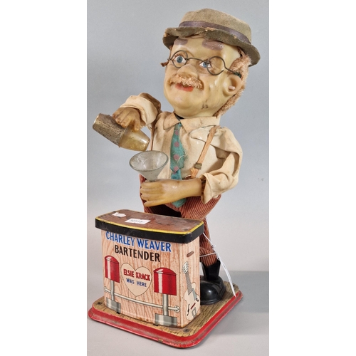 29 - Japanese tinplate, plastic and fabric 'Charlie Weaver' bartender, battery operated. 30cm high approx... 