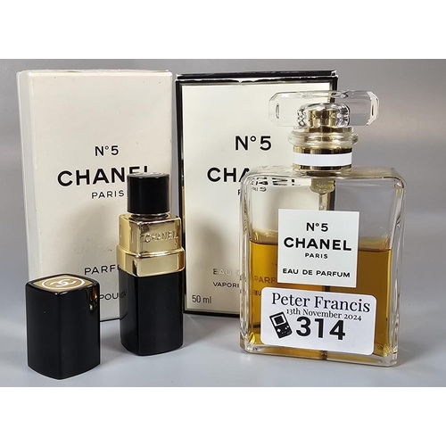 314 - Two Chanel No. 5 Paris perfume bottles in original boxes, one marked Parfum, the other Ea De Parfum.... 