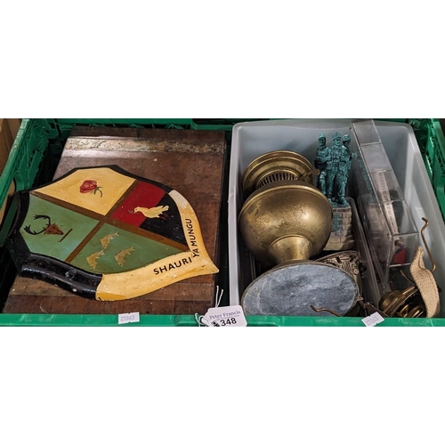 348 - Box of oddments to include: brass lamp, spoons, African hand painted plaque, military statue, Victor... 