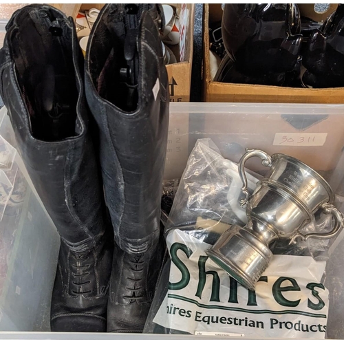 364 - Box of equestrian related items to include: three pairs of jodhpurs, pair of Ariat riding boots, Wes... 