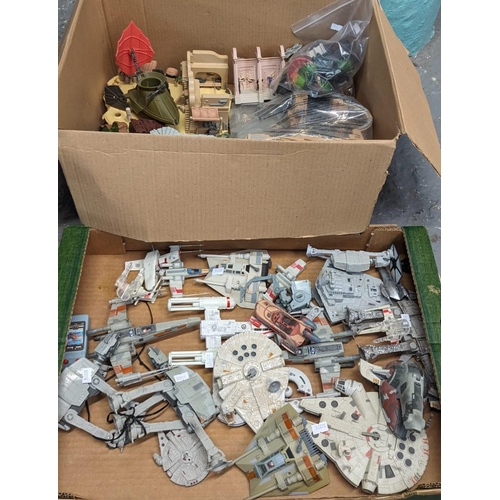 475 - Two boxes of modern Star Wars figures: At At figures, Millennium Falcon and other space ships. (2) (... 