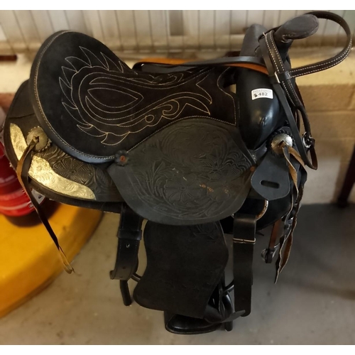 482 - Modern equestrian Western style horse riding saddle, complete with stirrups and bridal.  (B.P. 21% +... 