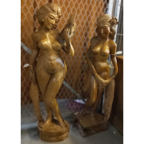 484 - Two Thai hardwood full length nude female figures. 1M and 1.05M high approx. (2)  (B.P. 21% + VAT)