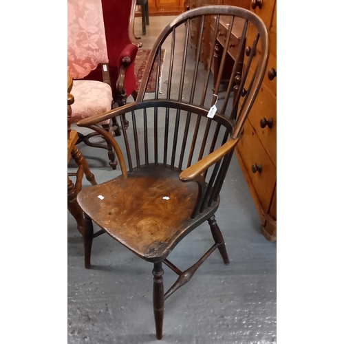 507 - 19th century ash and elm stick backed Windsor elbow chair, with moulded saddle seat on baluster turn... 