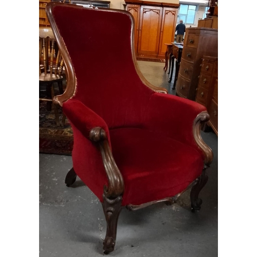 516 - Victorian mahogany upholstered show frame fireside chair, having arched back with scroll over arms a... 