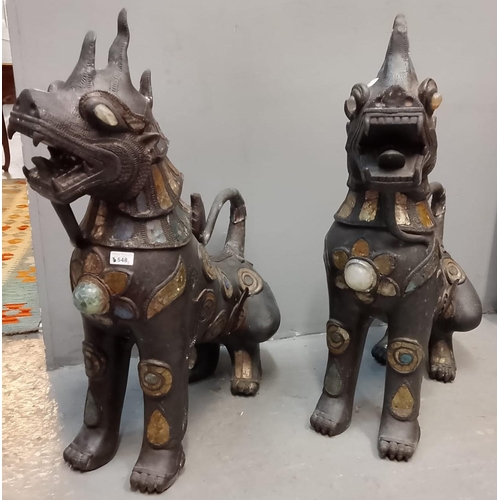 548 - Pair of Indonesian hollow cast metal  Dogs of Fo/Temple Dogs with semi precious stone decoration. 90... 