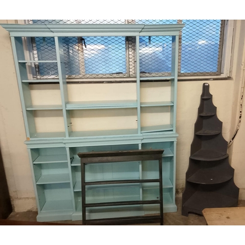 560 - Painted break front open library bookcase, with an arrangement of adjustable shelves under a moulded... 