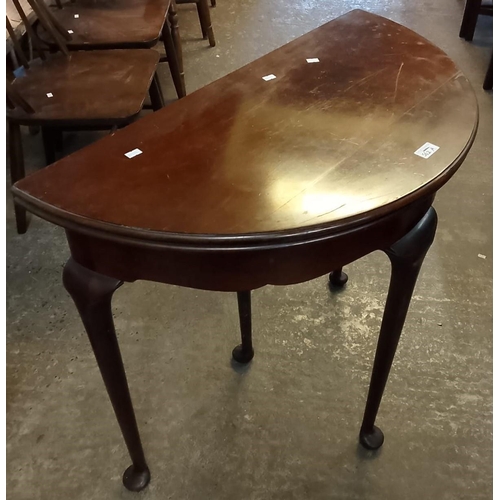 562A - 18th century style mahogany demilune fold over card table on cabriole legs with pad feet. 82x42x76cm... 