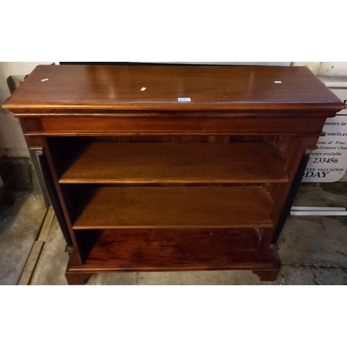 569 - Reproduction mahogany bookcase in Regency style with pillar supports on bracket feet. 104x32x102cm a... 