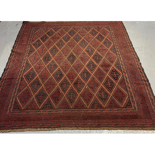 608 - Afghan Mushwani red, blue and yellow geometric rug with repeating lozenge panels. 188x160cm approx. ... 