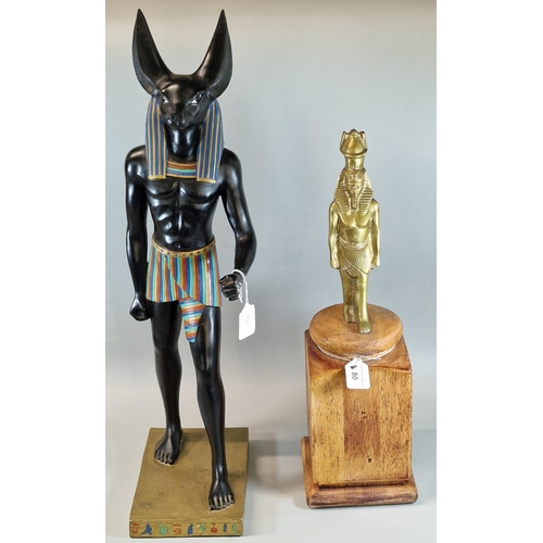 80 - Egyptian bronze statue of Ramesses on oak base together with an Egyptian resin Anubis statue. The ta... 