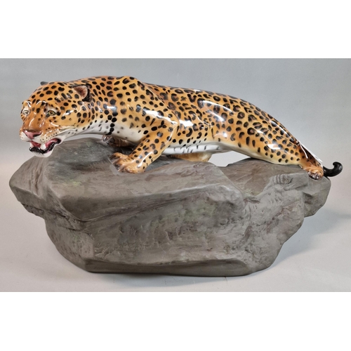 84 - Royal Doulton HN2638 large prestige model of a Leopard on naturalistic rock, marked to the underside... 