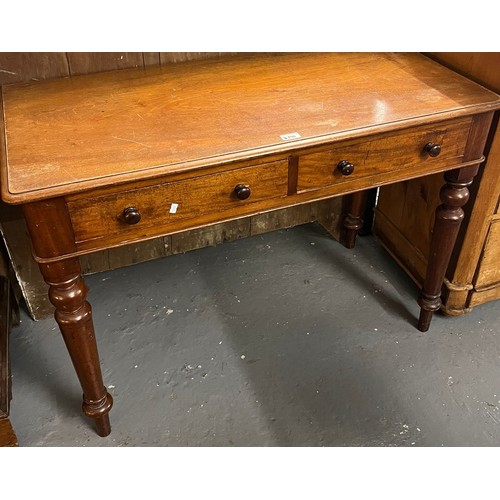 498 - Victorian mahogany straight fronted writing table with moulded edged top over three frieze drawers o... 