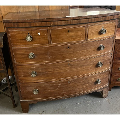 502 - George III mahogany bow fronted chest of three short and three long graduated cock beaded drawers, o... 