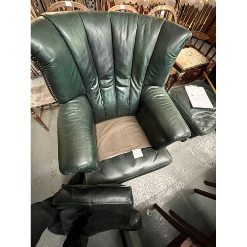 515 - Pair of modern deeply upholstered leather semi-wing easy chairs, with loose cushions and ball and cl... 