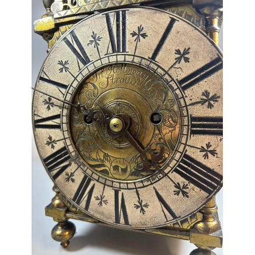 147 - 17th century brass lantern clock marked 'John Holloway of Stroud', having steel bell above foliate f... 