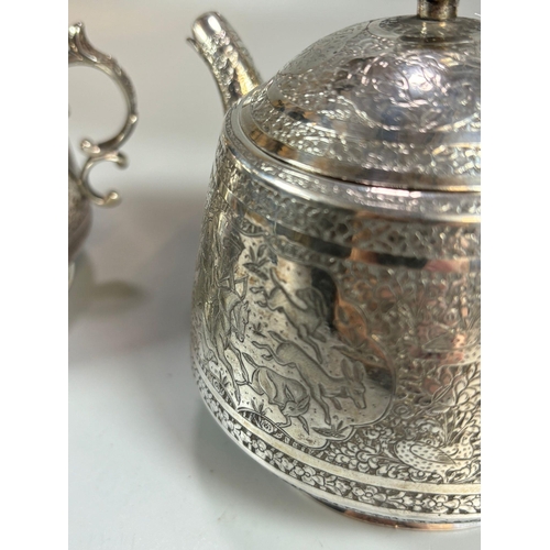 151 - White metal Persian part tea service, overall engraved with reserve panels of figures with horses, h... 