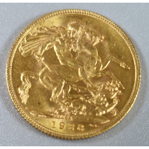 169 - George V cased gold sovereign dated 1928. (B.P. 21% + VAT)