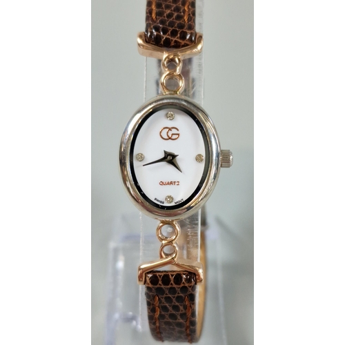 175 - Clogau Welsh silver and rose gold oval head ladies dress watch, with leather strap and leather box. ... 