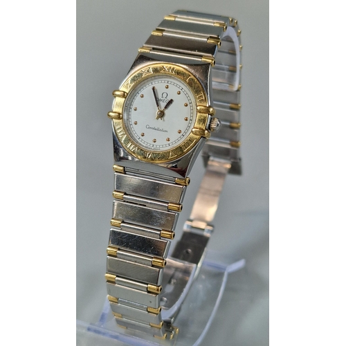 180 - Omega Constellation ladies' bi-metal bracelet wristwatch, having white face with spot numerals withi... 