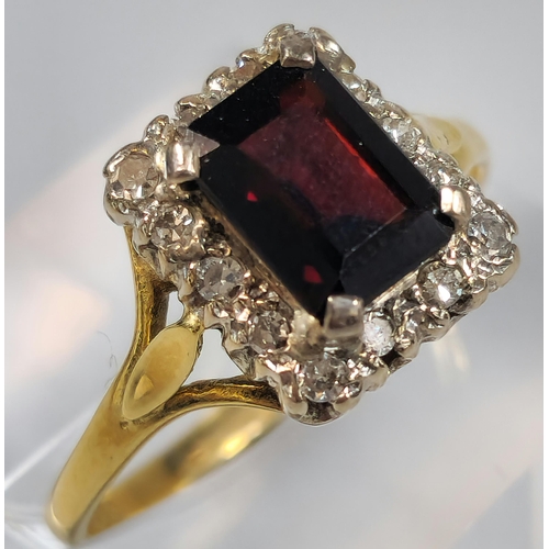 191 - 18ct gold red stone and diamond ring, the central rectangular faceted stone flanked tiny diamond chi... 