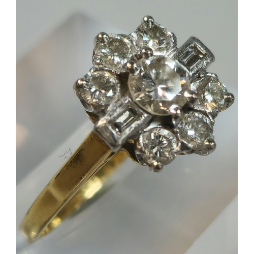 193 - 18ct gold and platinum diamond flowerhead ring, having seven brilliant round cut diamonds and two ba... 