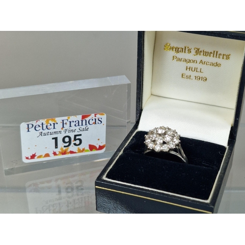 195 - 14ct white gold multi-cluster diamond ring. Approximately 1.25 carats. 5.4g approx. Size N1/2. (B.P.... 