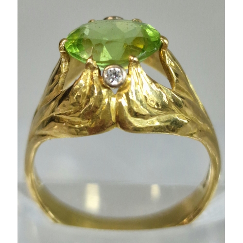 200 - 18ct gold tourmaline ring with two tiny diamond chips. 5g approx. Size N. (B.P. 21% + VAT)