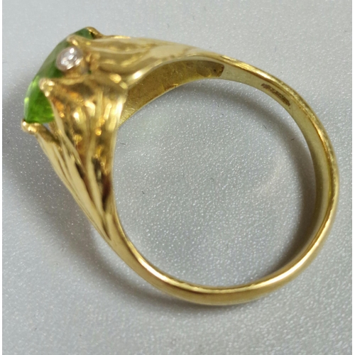 200 - 18ct gold tourmaline ring with two tiny diamond chips. 5g approx. Size N. (B.P. 21% + VAT)