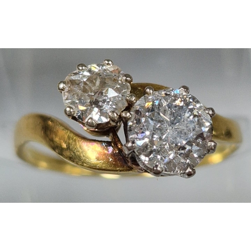 202 - Yellow metal round brilliant cut diamond two stone twist shank ring. 3.1g approx. Size Q1/2. (B.P. 2... 