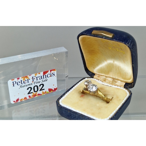 202 - Yellow metal round brilliant cut diamond two stone twist shank ring. 3.1g approx. Size Q1/2. (B.P. 2... 