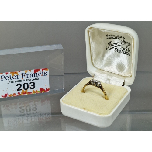 203 - 18ct gold and platinum diamond three stone ring. 2g approx. Size N1/2. (B.P. 21% + VAT)