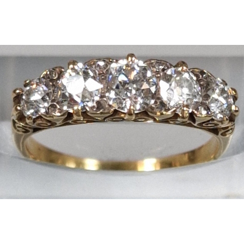 204 - Victorian design round brilliant cut five stone diamond ring of graduated form in ornate setting. 3.... 