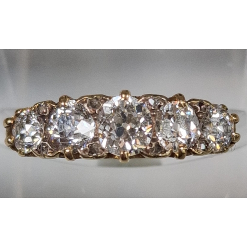 204 - Victorian design round brilliant cut five stone diamond ring of graduated form in ornate setting. 3.... 