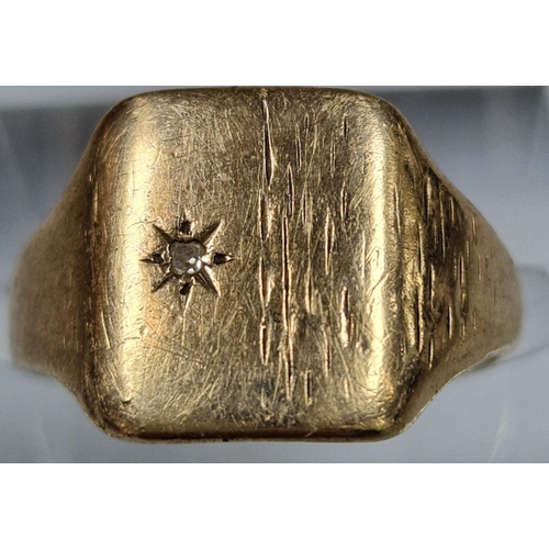 205 - 9ct gold signet ring, inset with tiny diamond chip. 4.5g approx. Size Q1/2.  (B.P. 21% + VAT)