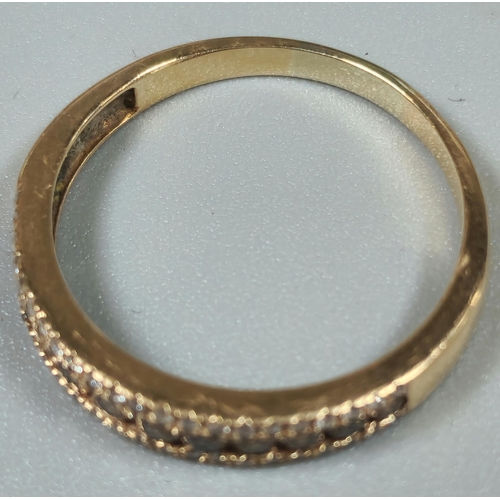 206 - Yellow metal chocolate and clear diamond half eternity ring. 2.2g approx. Size Q. (B.P. 21% + VAT)