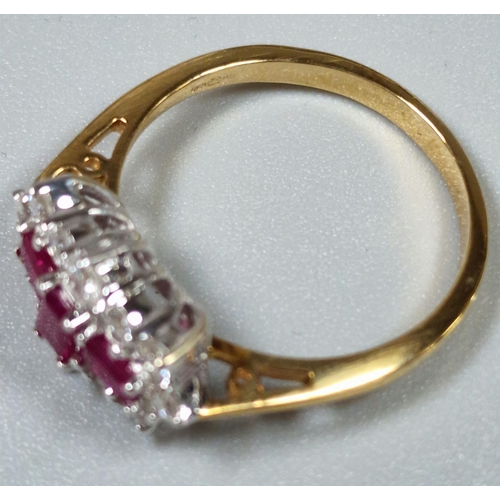 207 - 18ct gold diamond and ruby cluster ring, the three baguette rubies surrounded by brilliant cut diamo... 