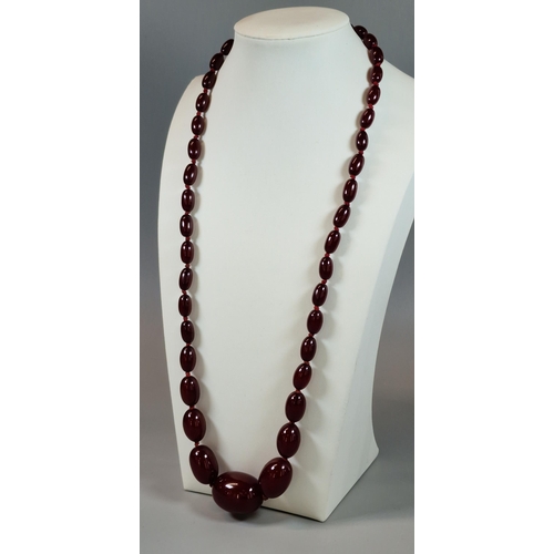 235 - 1930s Cherry Bakelite graduated beaded necklace. 50g approx. (B.P. 21% + VAT)