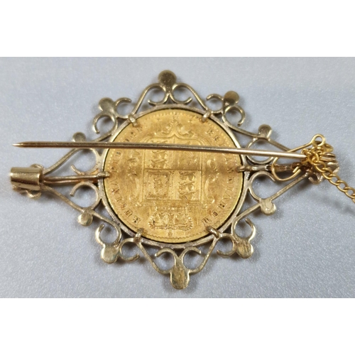 256 - Victorian gold half sovereign dated 1869, in 9ct gold ornate brooch mount. 7.8g approx. (B.P. 21% + ... 