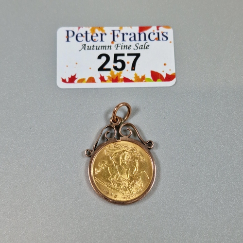 257 - George V gold half sovereign dated 1915, in 9ct gold pendant mount. 5.5g approx. (B.P. 21% + VAT)