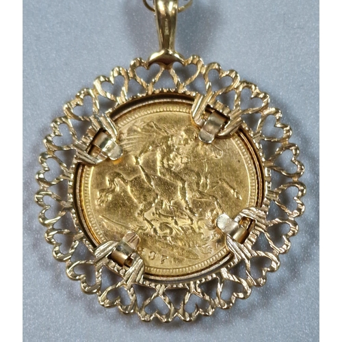 265 - Late Victorian gold half sovereign dated 1897, in heart shaped pendant mount on a 9ct gold curb-link... 