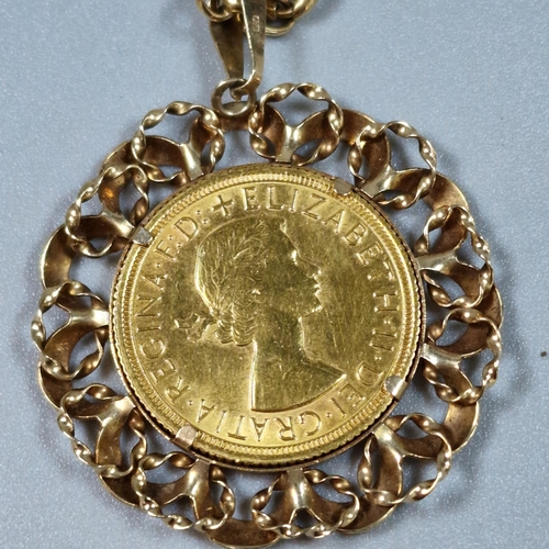 267 - Queen Elizabeth II gold full sovereign dated 1968, in 9ct gold ornate brooch mount with 9ct gold cur... 